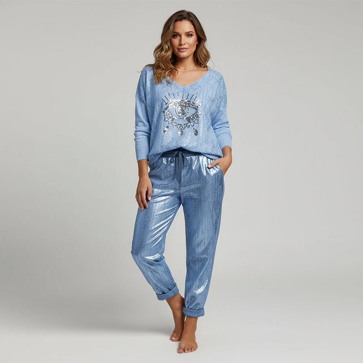 Set consisting of a top with gold foil ‘Devil's Eye’ and sequinned trousers
