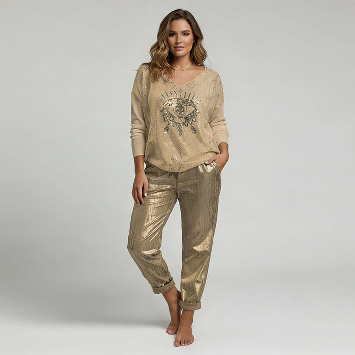 Set consisting of a top with gold foil ‘Devil's Eye’ and sequinned trousers